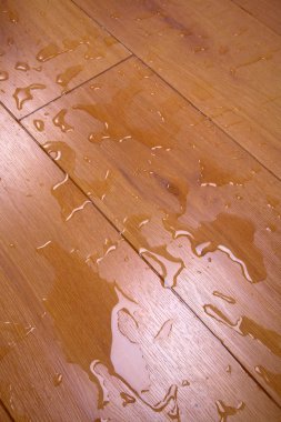 Water on a wooden covering clipart