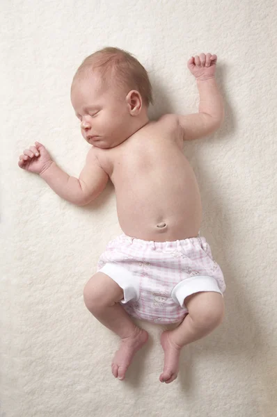 Das Baby auf der weichen — Stockfoto