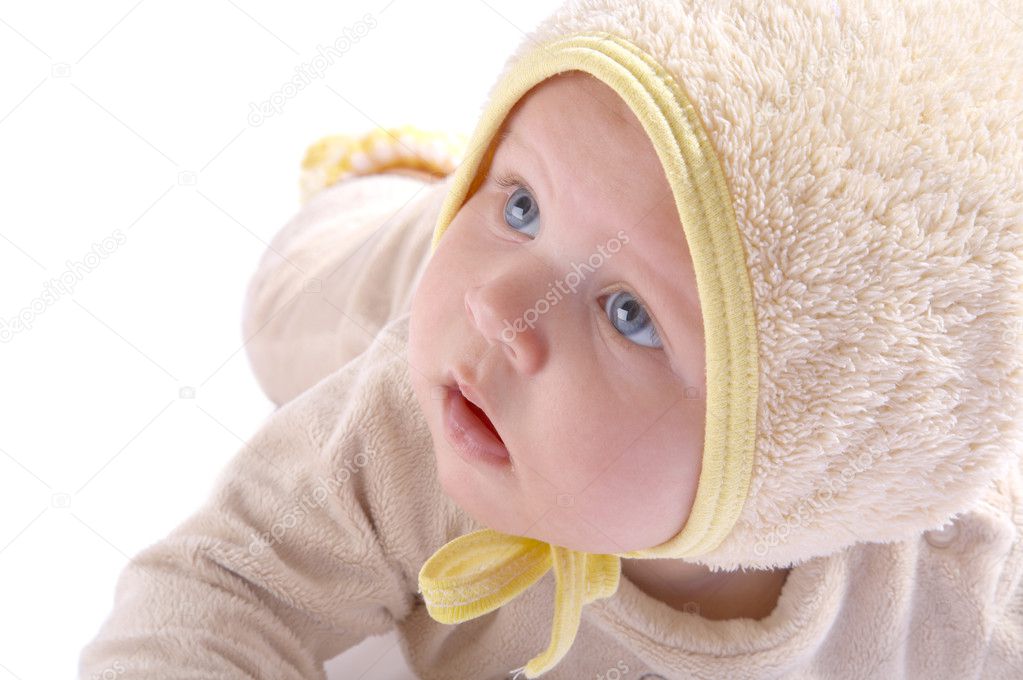 Baby crawling on blanket