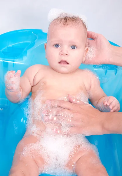 Kid in foam — Stock Photo, Image