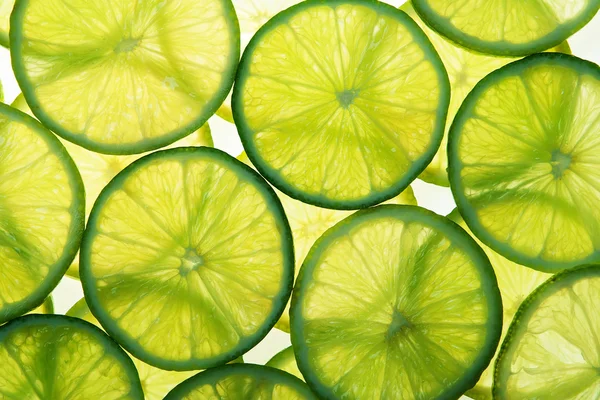 Green lime slices in many layers — Stock Photo, Image