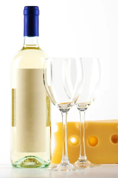 Bottle of white wine and two empty wine — Stock Photo, Image