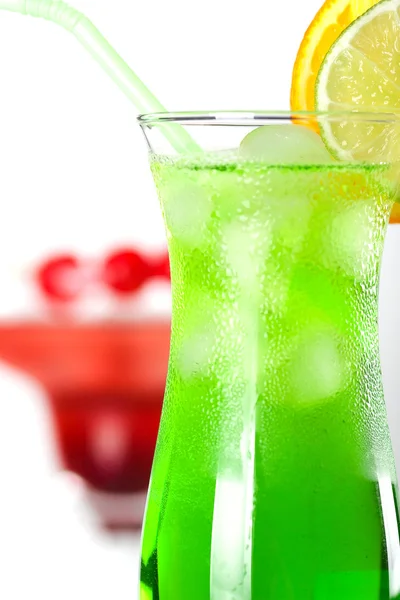 Green and red tropical cocktails — Stock Photo, Image