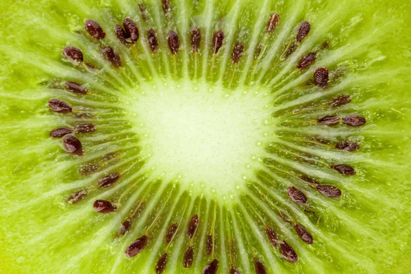 Recolección de alimentos macro - rodaja de kiwi — Foto de Stock