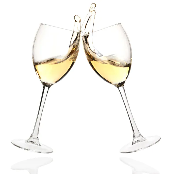 Clink bril met witte wijn — Stockfoto