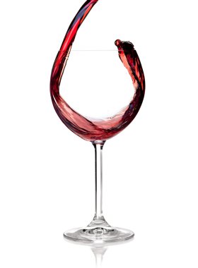 Red wine is poured into a glass clipart