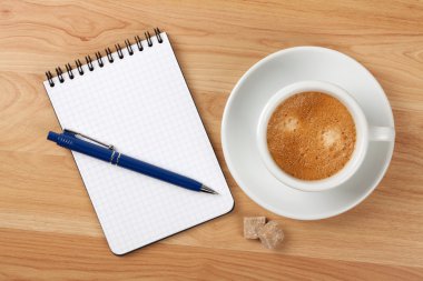 Blank notepad with pen and cappucino cup clipart