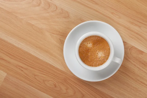 Copo de café expresso na mesa de madeira — Fotografia de Stock