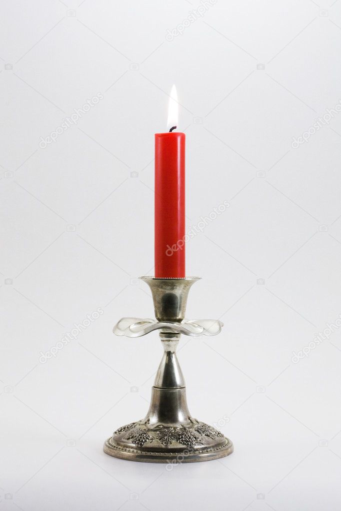 Red candle and candlesticks