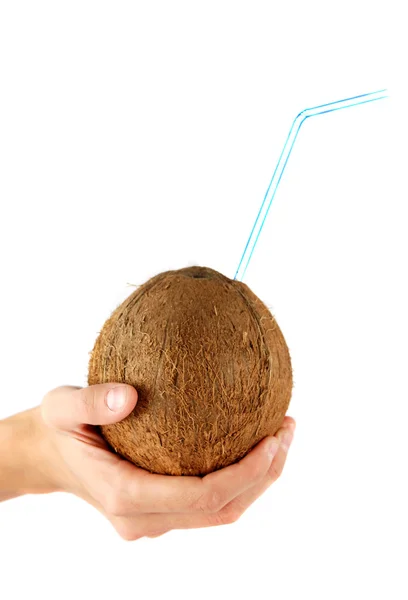 Coco en la mano con tubo —  Fotos de Stock