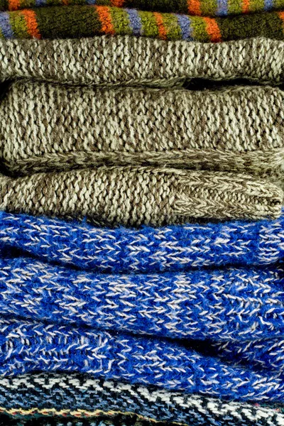 Hromadu teplé svetry — Stock fotografie