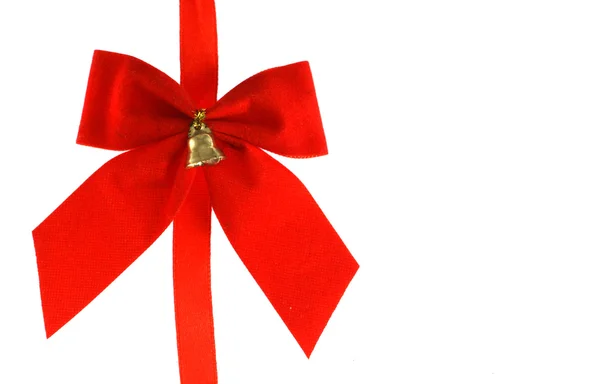 Big red holiday bow with bell — Stock Photo, Image