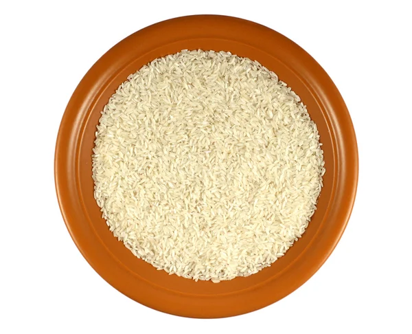 Рис на коричневой керамической пластине — стоковое фото