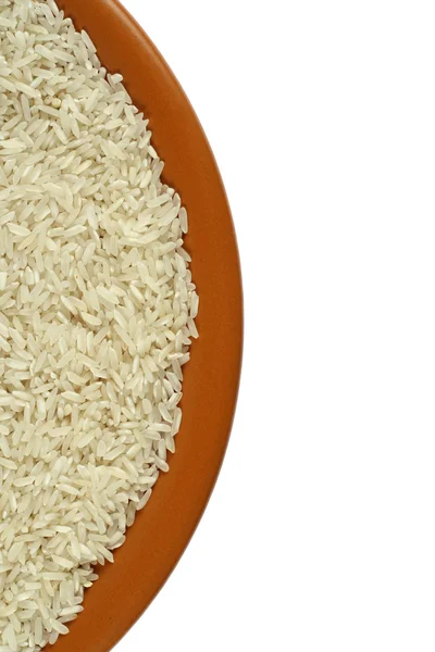 Üzerinde kahverengi bir seramik tabak pirinç — Stok fotoğraf