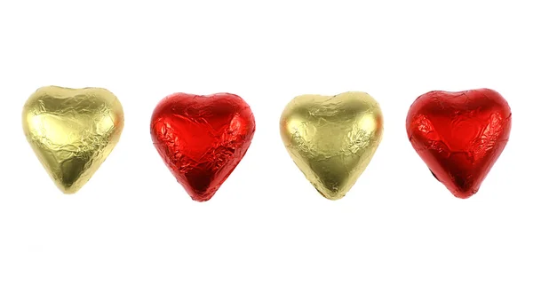 Четыре шоколадных сердца — стоковое фото