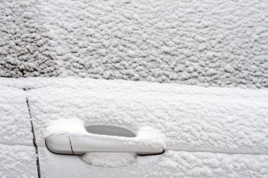 Parked car covered with snow clipart