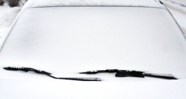 Snow-covered car clipart