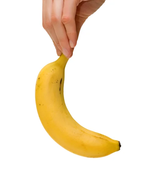 Банан в руке — стоковое фото