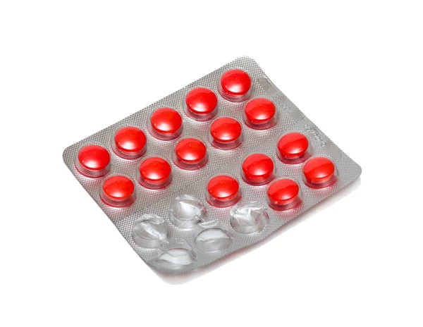 Opakowanie czerwonych tabletek — Zdjęcie stockowe