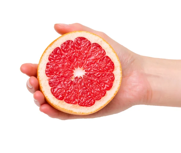 Polovina grapefruitu v ruce — Stock fotografie