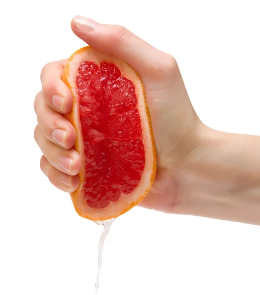 Stlačování grapefruitu — Stock fotografie