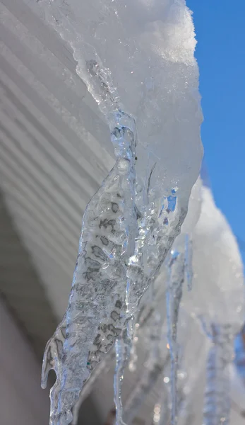 Icicles on the eaves — Stock Photo, Image