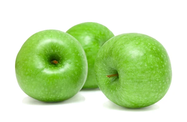 Tři zelená jablka — Stock fotografie