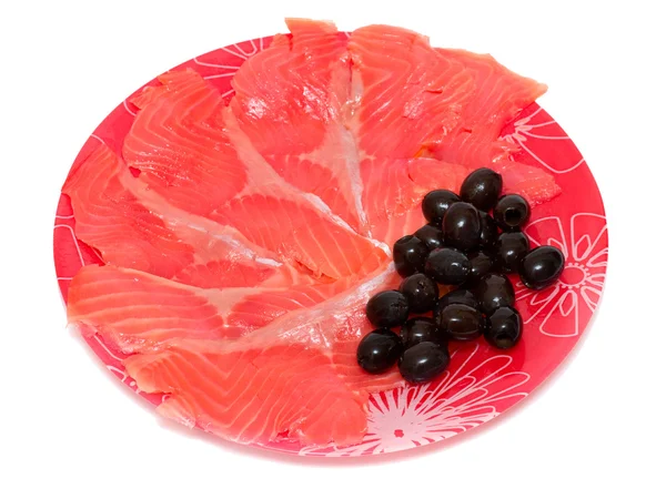 Красная рыба и оливки — стоковое фото