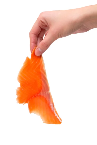 Красная рыба в руке — стоковое фото
