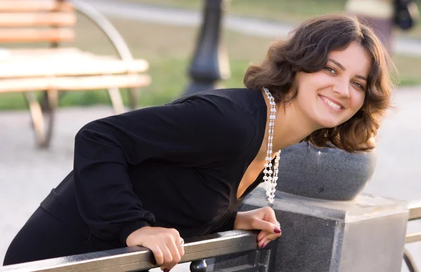 stock image Dark hair girl in black dress