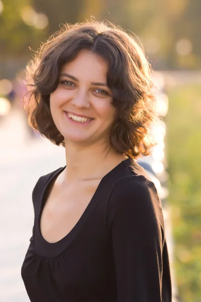 stock image Dark hair girl in black dress