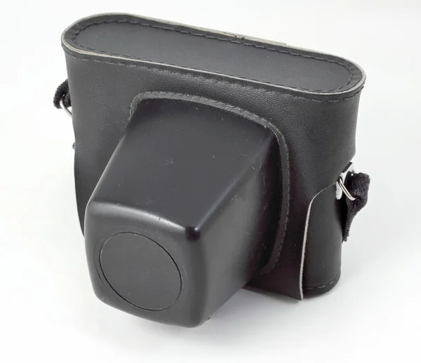 Old SLR photo camera in case — Stock Photo, Image