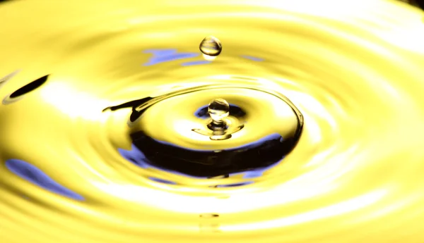 stock image Golden water drop