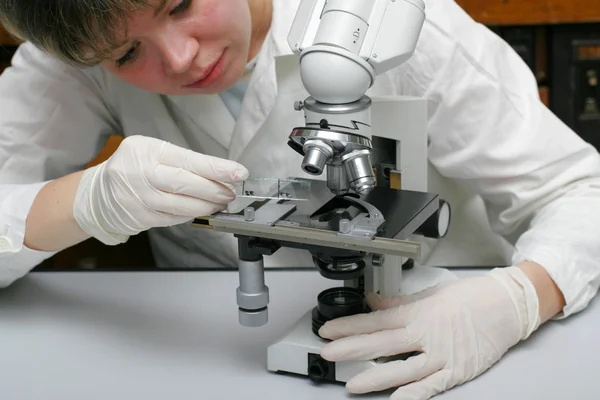 Scientist and microscope — Zdjęcie stockowe