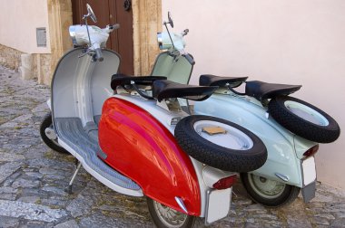 Famous old fashioned italian scooter clipart