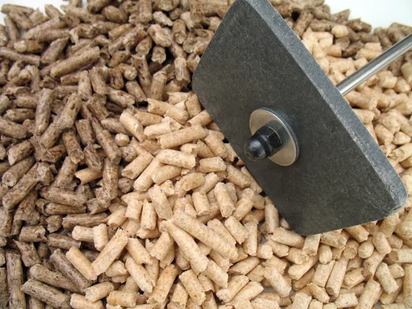 Wood pellets and shovel — Stock Photo, Image