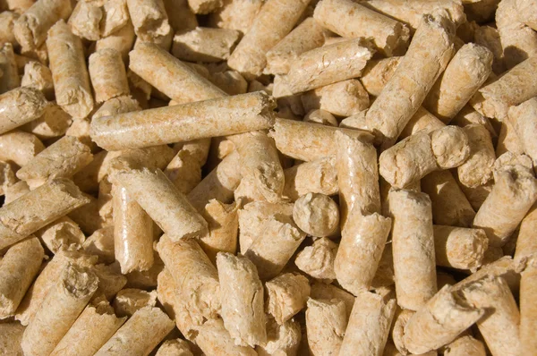 Wood pellets and red deal — Stock Photo, Image