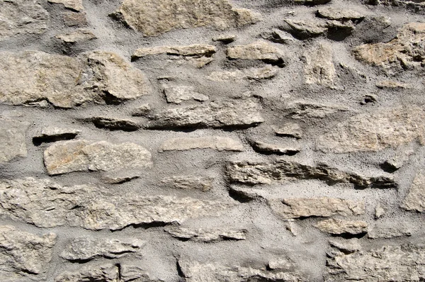 Muro de piedra con cemento Fotos de stock