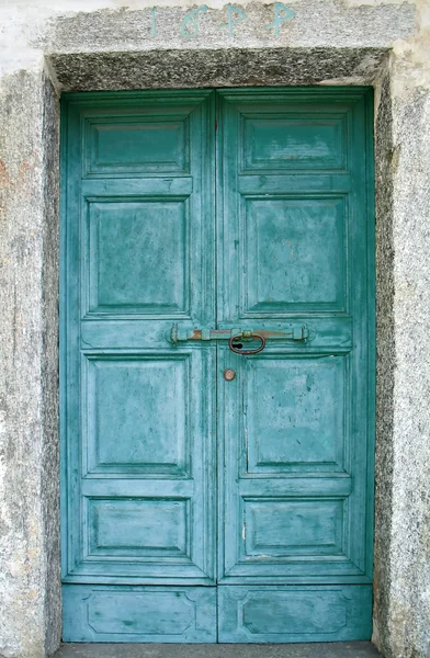 Oude groene deur Rechtenvrije Stockafbeeldingen