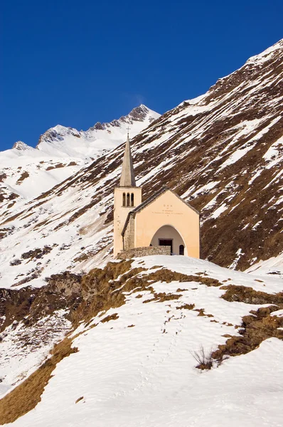 stock image Church in winter alpine landscape