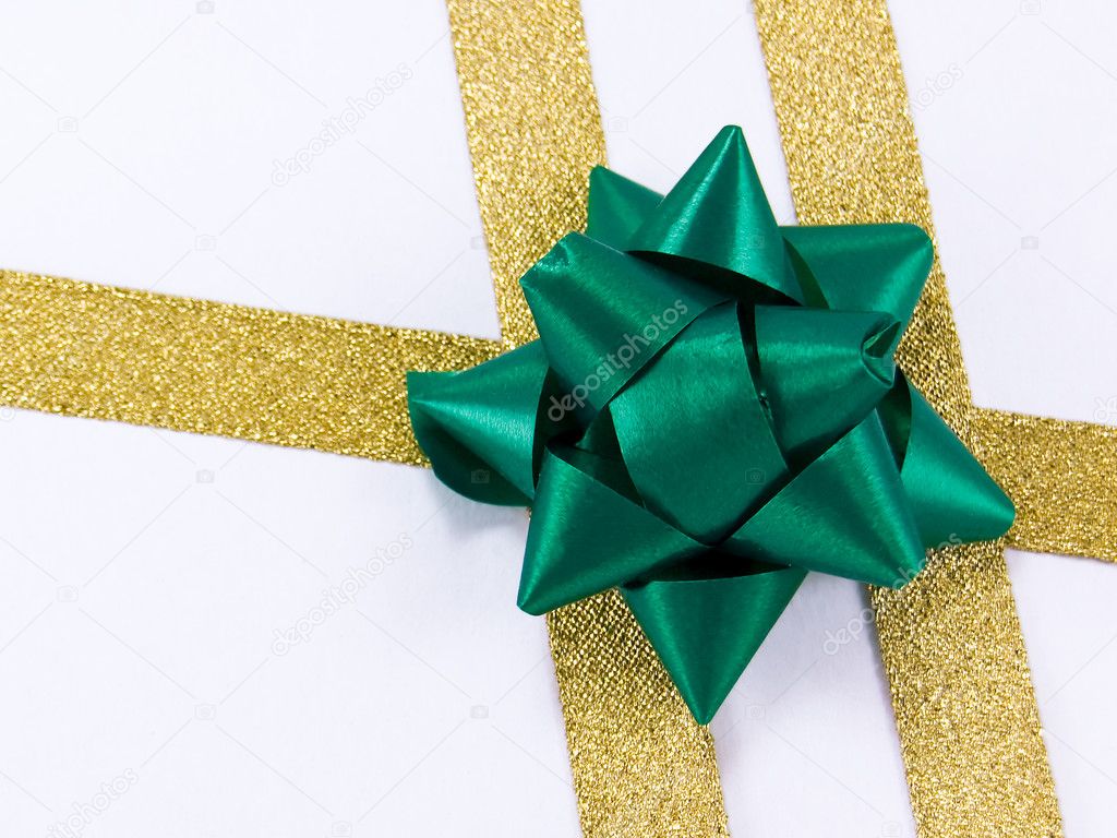 Golden ribbon with green bow