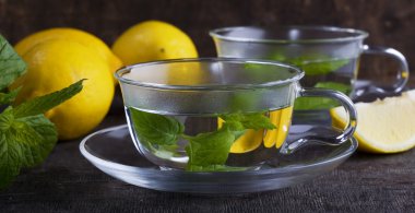 Mint tea with lemon clipart