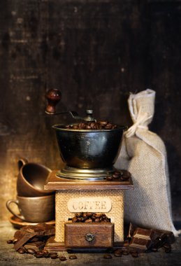 Stiill life with Antique coffee grinder clipart