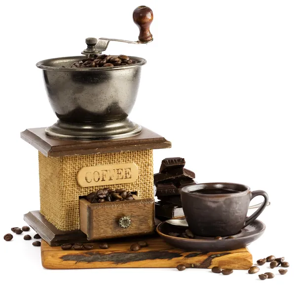 Натюрморт с чашкой кофе и кофе — стоковое фото