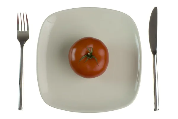 Plate with fresh tomato. Isolated on whi — Stock Photo, Image