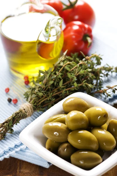 Bottle of Olive oil and condiments — Stock Photo, Image