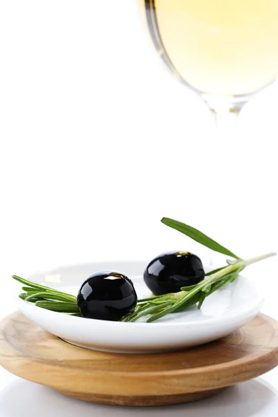 橄榄和白葡萄酒 图库图片