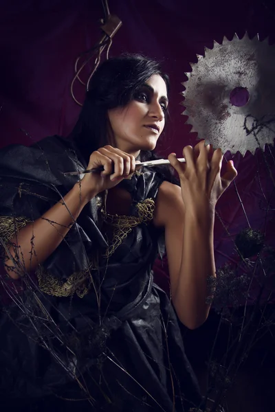 Stylised witch in bushes — Stock Photo, Image
