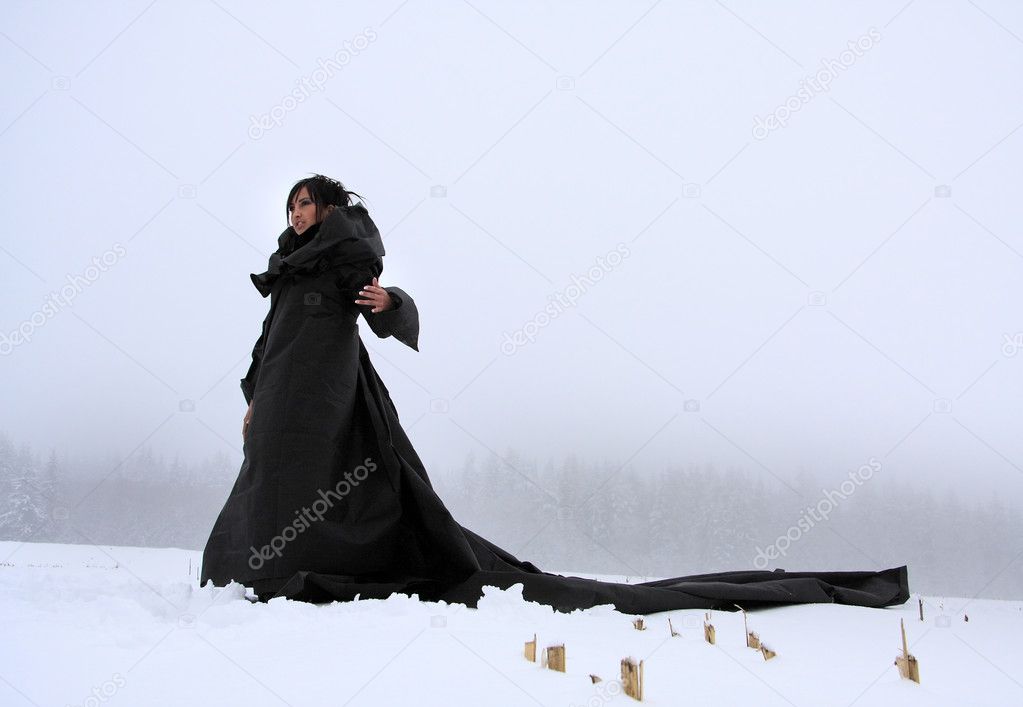 Mysterious girl in a long black dress