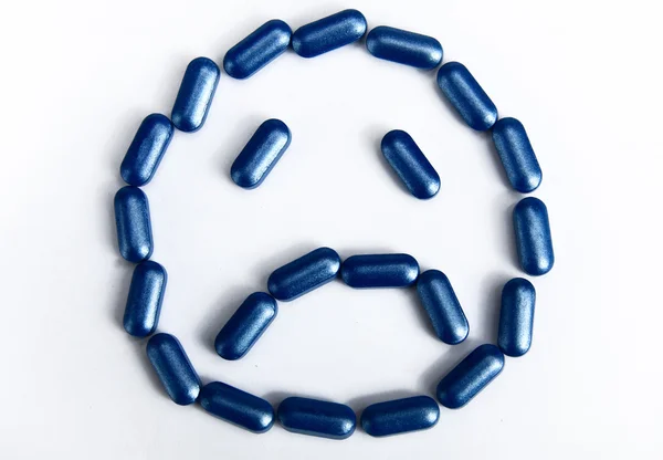 Szomorú arc által tabletták — Stock Fotó